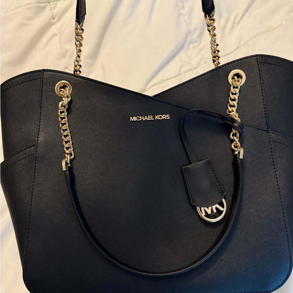 Michael Kors Black and Gold Tote with Classic Silhouette